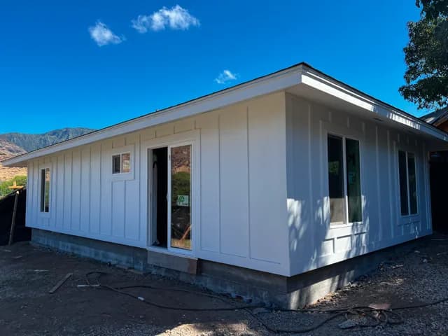 A finished Tall Builders home on Oʻahu under a clear blue sky